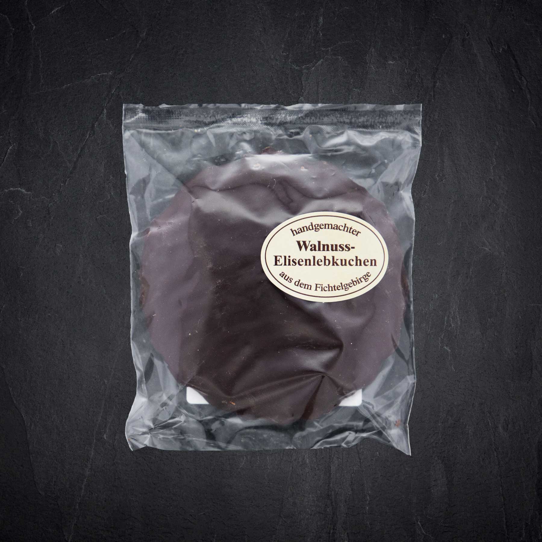 Ein Walnuss Elisen-Lebkuchen mit Zartbitterschokolade